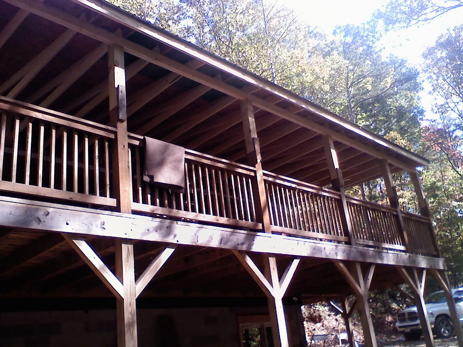 Timber framing under a new elevated porch and deck — Roof Leak Repair in Summerland by Roofing Brothers